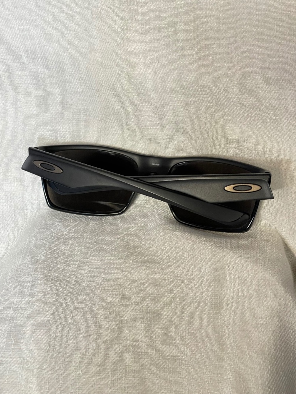 Oakley Matte Black Rectangular Sunglasses with Silver Logos